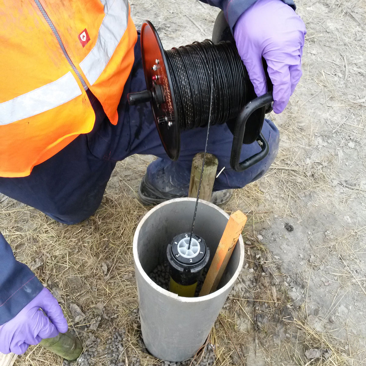 measuring water levels in cmt with a solinst 102 water level meter