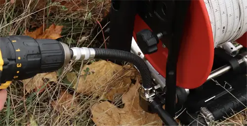 Solinst Flex Adaptor Connected To Cordless Drill That Is Driving The 101 Power Winder To Raise And Lower A Solinst Water Level Meter solinst flex adaptor connected to cordless drill that is driving the 101 power winder to raise and lower a solinst water level meter