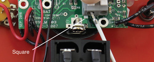 connect the tape to the new circuit board assembly by pressing down on the white terminals on the circuit board and inserting the tape leads