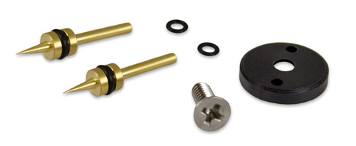 image shows laster tape seal plug for solinst meters that includes two brass tubes two orings a screw with phillips head and a black spacer disk