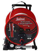 solinst power winder installed on 105 well casing and depth indicator