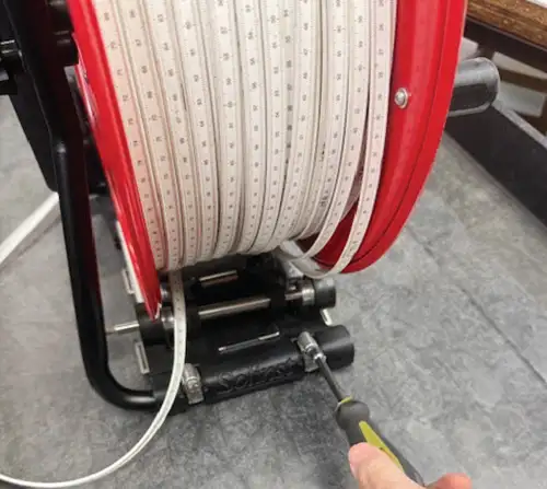 With the reel back upright adjust the Power Winder using its Gear Clamps, if required with the reel back upright adjust the power winder using its gear clamps, if required